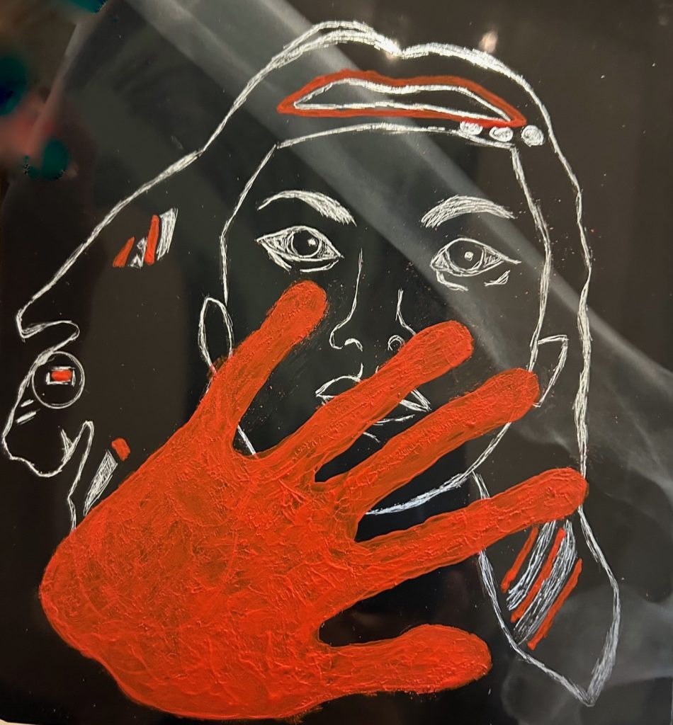 Red hand symbolizing the MMIW movement