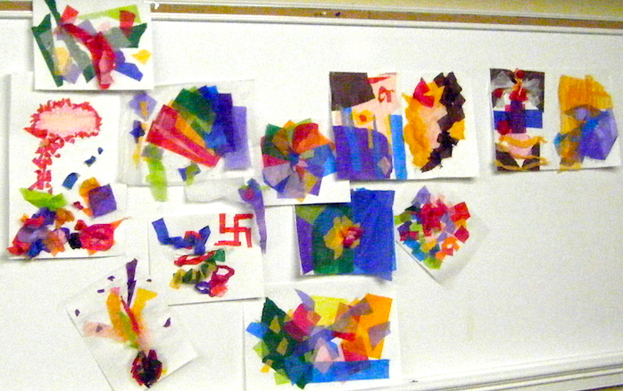 Completed tissue paper collages arranged by participants. Note the ancient gammadion cross on one of the collages.