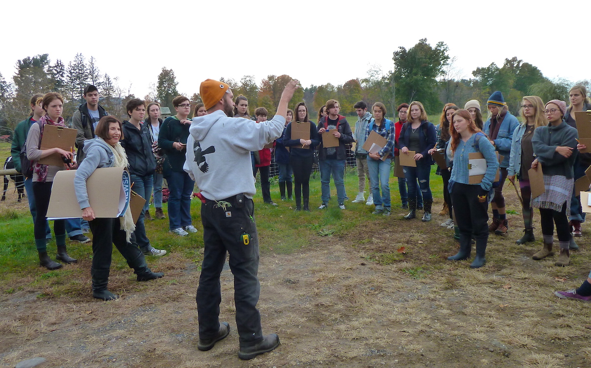 Farm manager orienting students to the farm